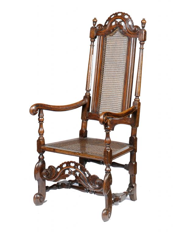 A QUEEN ANNE WALNUT AND CANED ELBOW CHAIR, C1710-20  on 'horse bone' forelegs, 126cm h++Wormed in