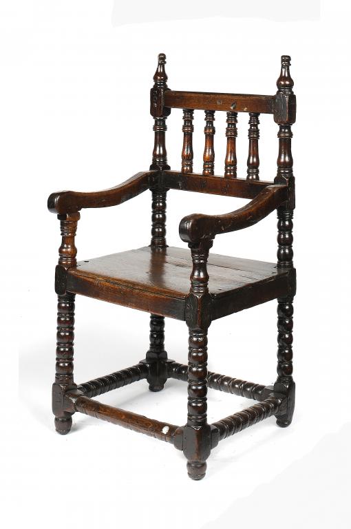 A CHARLES II OAK AND FRUITWOOD ARMCHAIR, C1680 with spindle back and bobbin turned legs and