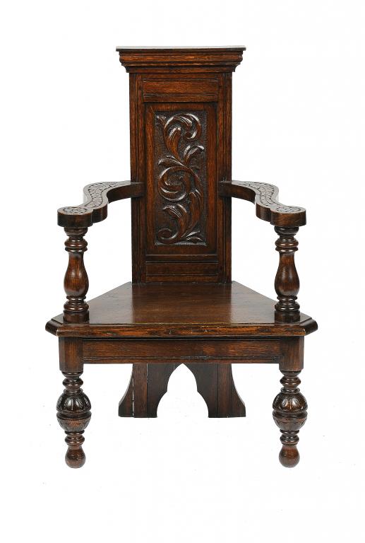 A 17TH CENTURY STYLE CARVED OAK CAQUETEUSE, C1900  97cm h, underside of the seat carved 8302++Of