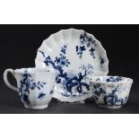 AN EARLY WORCESTER BLUE AND WHITE FLUTED TRIO,  c1756-60 painted with the Prunus Root pattern,