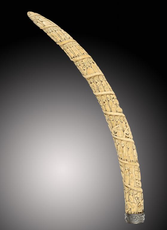 TRIBAL ART. A VILI CARVED IVORY ELEPHANT TUSK, LOANGO, 1870S-1920S  carved with a spiral of ninety