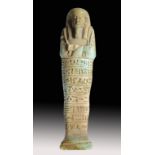 ANTIQUITIES.  AN EGYPTIAN TURQUOISE GLAZED COMPOSITION SHABTI OF PSAMTEK (AHMOSE), 26TH DYNASTY (