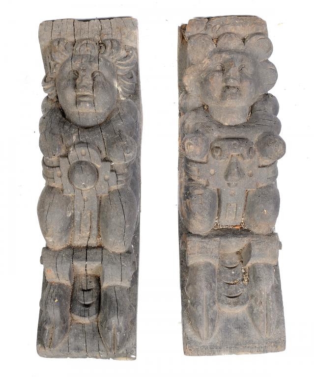 TWO JACOBEAN OAK CORBELS, POSSIBLY FROM THE FRONT ELEVATION OF A BUILDING,  EARLY 17TH C  boldly