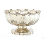 A VICTORIAN SILVER FLUTED ROSE BOWL  foliate embossed, crested, 31cm diam, by Martin, Hall & Co Ltd,