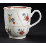 A WORCESTER COFFEE CUP, C1775  of Gold Queen's pattern with polychrome sprigs, 6cm h++Localised wear