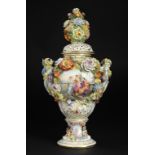 A POTSCHAPPEL FLORAL ENCRUSTED POT POURRI VASE AND COVER, LATE 19TH C painted with classical