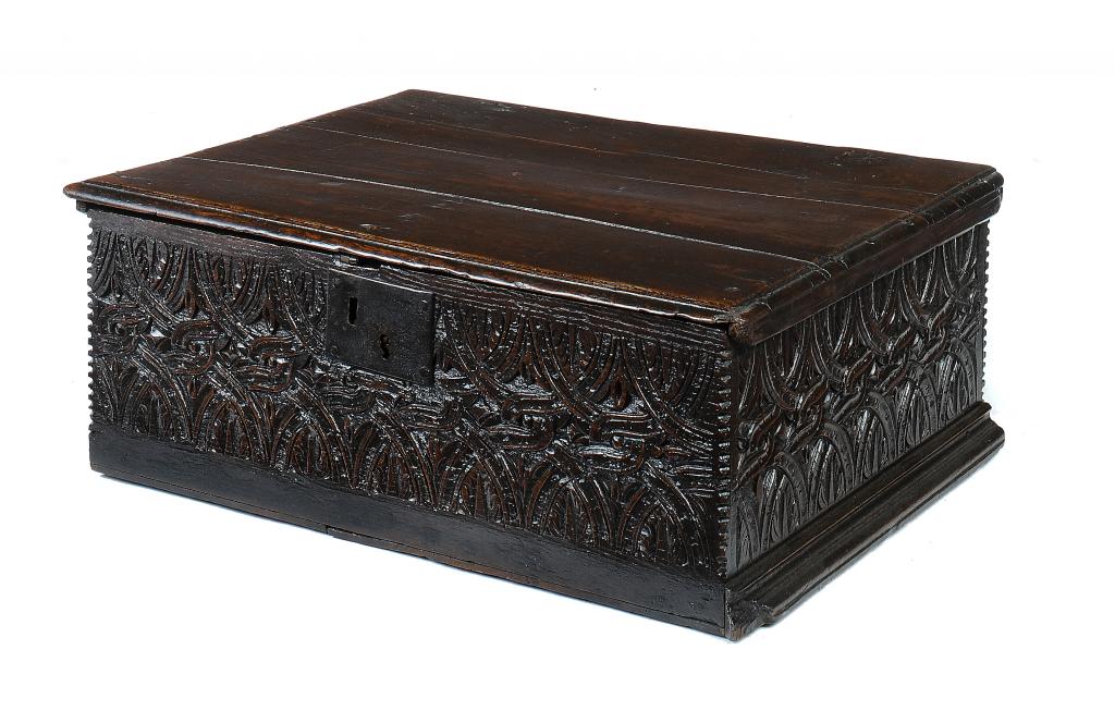 A CHARLES II BOARDED OAK BOX, LATE 17TH C   carved with a complicated guilloche pattern, iron