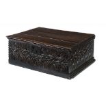 A CHARLES II BOARDED OAK BOX, LATE 17TH C   carved with a complicated guilloche pattern, iron