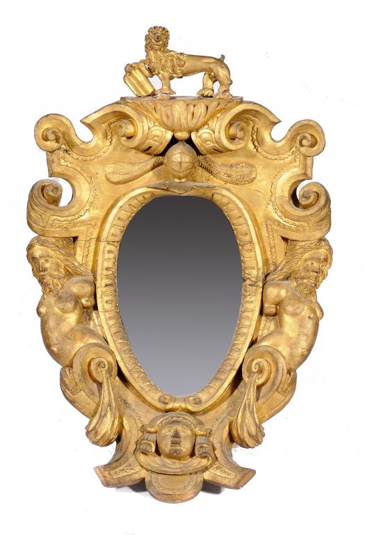 A GILTWOOD ARMORIAL CARTOUCHE ADAPTED AS A MIRROR, POSSIBLY DUTCH,  LATE 17TH C  boldly carved and