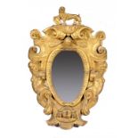A GILTWOOD ARMORIAL CARTOUCHE ADAPTED AS A MIRROR, POSSIBLY DUTCH,  LATE 17TH C  boldly carved and