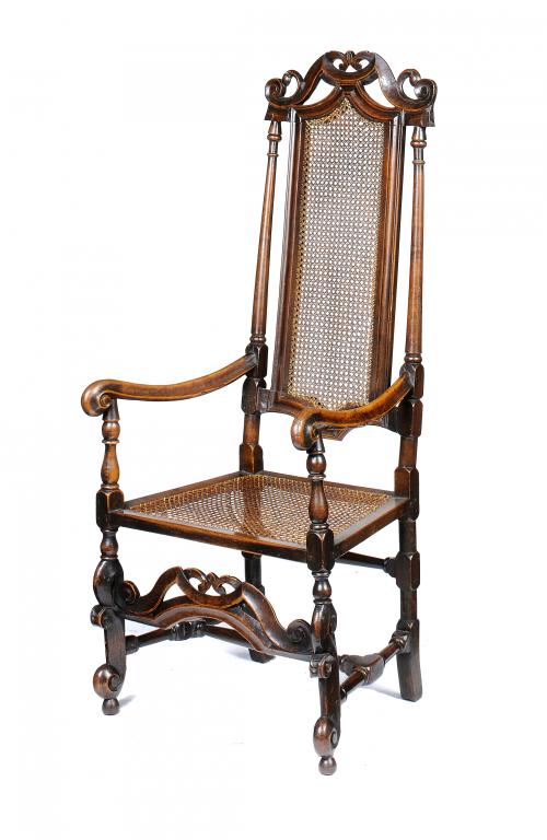 A QUEEN ANNE WALNUT AND CANED ELBOW CHAIR, C1710-20  136cm h++Old sheet metal repair at back of