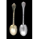 A CHARLES II SILVER GILT TREFID SPOON AND A WILLIAM AND MARY SILVER TREFID SPOON  the first engraved