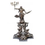 A BRONZE CANDELABRUM OF RECENT MANUFACTURE  in the form of Jupiter on an eagle, 96cm h++In