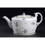 A CAUGHLEY RIBBED OVAL TEAPOT AND COVER, C1795 decorated with the Dresden sprigs pattern, 12cm h++