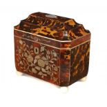 AN EARLY VICTORIAN TORTOISESHELL TEA CADDY  inlaid to the front in mother of pearl with engraved