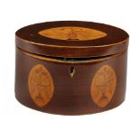 A GEORGE III MAHOGANY AND INLAID OVAL TEA CADDY, C1800  with vase paterae, 19cm w++Lock and hinge