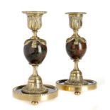 A PAIR OF VICTORIAN BRASS MOUNTED SERPENTINE DESK CANDLESTICKS, C1870  16.5cm h++Serpentine knop