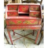 A 1920'S SCARLET JAPANNED BUREAU ON STAND, LACKS FLAP