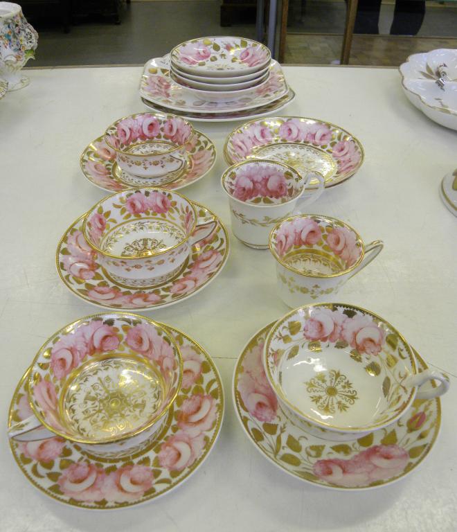 A SPODE PART TEA AND COFFEE SERVICE PAINTED WITH ROSE BORDERS, PAINTED MARK AND 3614, EARLY 19TH C