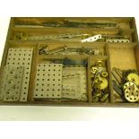 A MECCANO OUTFIT WITH PART ORIGINAL INSTRUCTIONS AND WOOD BOX