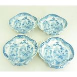 A SET OF FOUR MASON'S PATENT IRONSTONE BLUE AND WHITE SHELL SHAPED DISHES