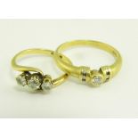 A DIAMOND THREE STONE RING AND ANOTHER DIAMOND RING IN GOLD, MARKED 18CT OR 750, 5.3G