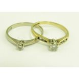 TWO DIAMOND SOLITAIRE RINGS IN 9CT GOLD OR WHITE GOLD, MARKED 18K, 3.7G