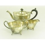 A GEORGE V SILVER THREE PIECE TEA SERVICE, BIRMINGHAM 1924 AND 25 (MARKS ON TEAPOT RUBBED), 31 OZS