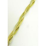 A 9CT GOLD TEXTURED THREE STRAND ENTWINED BRACELET, 24G