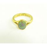 AN OPAL RING IN 22CT GOLD, ADAPTED, 4.7G