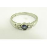 A SAPPHIRE AND DIAMOND THREE STONE RING IN PLATINUM, 4.4G