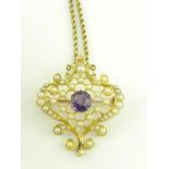 AN ART NOUVEAU AMETHYST AND CULTURED PEARL BROOCH - PENDANT OF TRELLIS DESIGN, CIRCA 1910 WITH