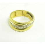 A DIAMOND RING IN GOLD. 6.4G