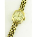 AN ACCURIST 9CT GOLD LADY'S WRISTWATCH AND BRACELET, 15.3G