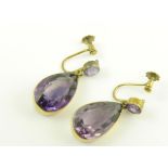 A PAIR OF ROUND AND PEAR SHAPED AMETHYST EARRINGS IN GOLD, MARKED 9CT