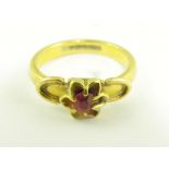 A SYNTHETIC RUBY RING IN 22CT GOLD, ADAPTED, 5.3G