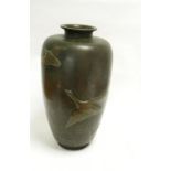 A  LARGE JAPANESE BRONZE VASE, APPLIED WITH GEESE AND PLANTS WITH ENGRAVED DETAIL, MEIJI