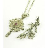 A CONTINENTAL RUBY AND DIAMOND CROSS ON LONG SILVER CHAIN AND A CULTURED PEARL SPRAY BROOCH,