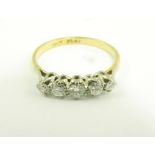 A DIAMOND FIVE STONE RING IN GOLD, MARKED 18CT PLAT, 2.3G