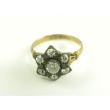 AN ANTIQUE DIAMOND CLUSTER RING ON LATER 9CT GOLD  HOOP, 3G