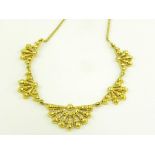 A GOLD NECKLACE OF PALMETTE DESIGN, 32.3G