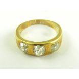 A DIAMOND THREE STONE RING IN GOLD, ENGRAVED WITH THE DATE 1872, 4.9G