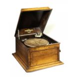 A COLUMBIA MODEL 117A OAK TABLE GRAMOPHONE  with brass trade label of A HINDLEY 21 CLUMBER ST