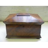 A VICTORIAN MAHOGANY TEA CADDY OF SARCOPHAGUS SHAPE COMPLETE WITH THE THREE ORIGINAL MAHOGANY TEA