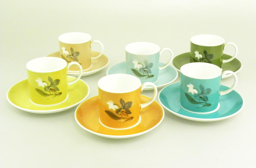 A HARLEQUIN SET OF SIX SUSIE COOPER BONE CHINA COFFEE CUPS AND SAUCERS