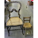 A VICTORIAN MOTHER OF PEARL INLAID PAPIER MACHE BEDROOM CHAIR, CANED SEAT AND TWO MINIATURE CHAIRS