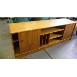 A 1970'S TEAK SIDEBOARD WITH SLIDING DOORS