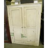 A VICTORIAN PAINTED PINE CUPBOARD FITTED WITH SHELVES ENCLOSED BY A PAIR OF PANELLED DOORS