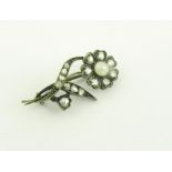 AN ANTIQUE ROSE DIAMOND AND CULTURED PEARL FLOWER BROOCH, 19TH CENTURY