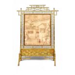 A 19TH CENTURY CHINESE BAMBOO AND RATTAN FIRESCREEN